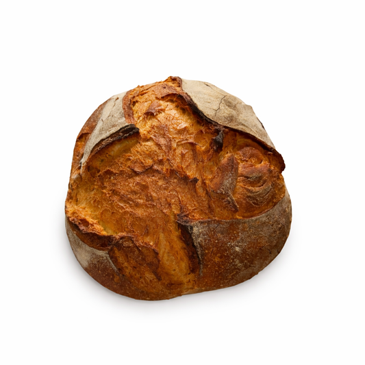 Pane basso di Matera del Panificio Perrone, pagnotta artigianale con crosta dorata e forma compatta